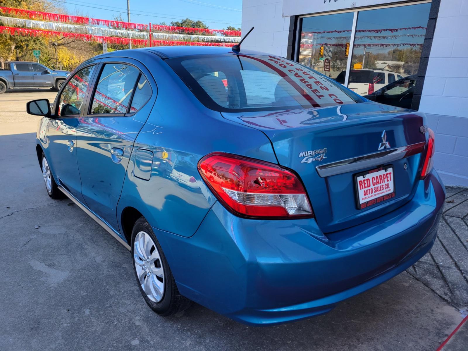2020 Blue Mitsubishi Mirage G4 (ML32F3FJ1LH) with an 1.2L I3 F DOHC 12V engine, Automatic transmission, located at 503 West Court, Seguin, TX, 78155, (830) 379-3373, 29.568621, -97.969803 - Photo #3